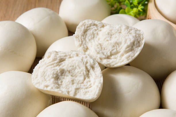 istock Chinese food half steamed bun close up on table. 1358165556