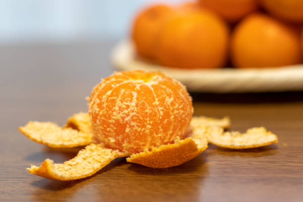 istock A peeled delicious orange on the table 1358169819