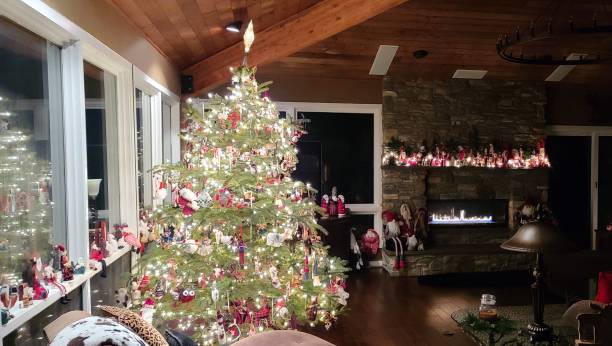 istock Stunning Christmas Tree with Cozy Fireplace in a Lodge Style Atmosphere 1358173294