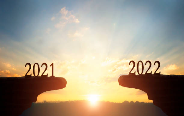 istock 2022 concept:2022 on the mountain at sunset background 1358176656