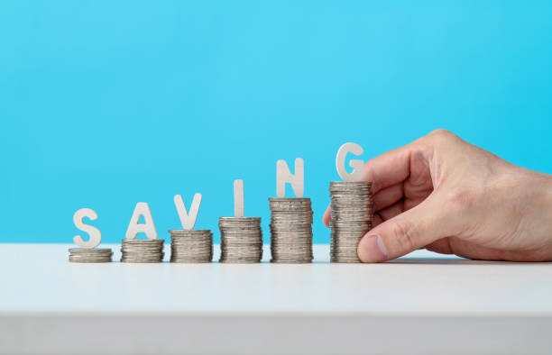 istock Word saving on heap of coins 1358177558