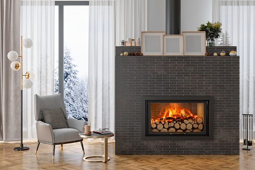 Contemporary fireplace with glass screen installed in white wall in living room at home