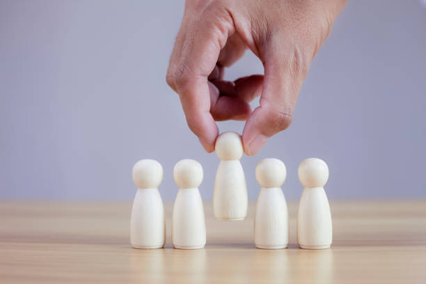 istock Businessman chooses best successful people model team leadership 1358187494