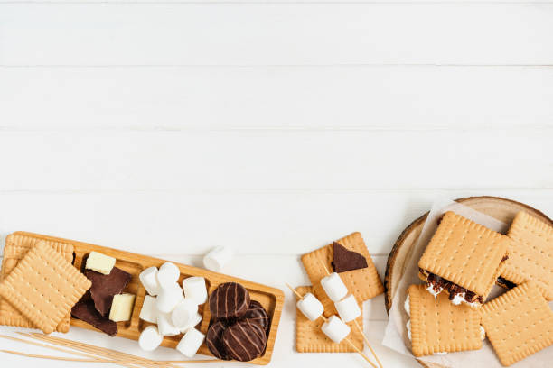 istock S'mores roasting marshmallows with chocolate between cookies 1358191218