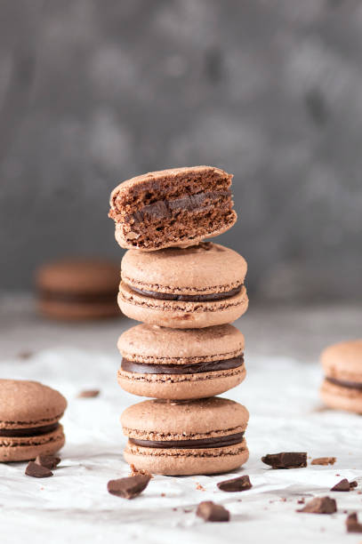 istock Homemade chocolate macaroons with chocolate ganash 1358191314