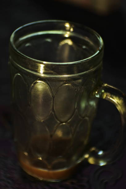istock empty glass cup. glass for beverage containers. an empty glass that has run out of drink. 1358192074