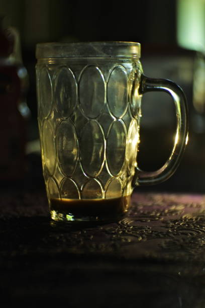 istock empty glass cup. glass for beverage containers. an empty glass that has run out of drink. 1358192102