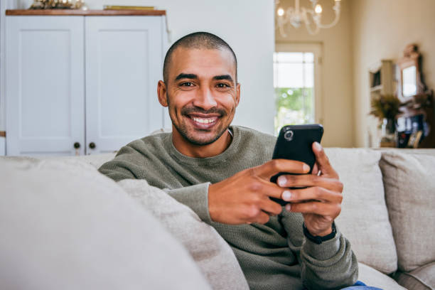 istock Shot of a young man using his smartphone to send text messages 1358192347