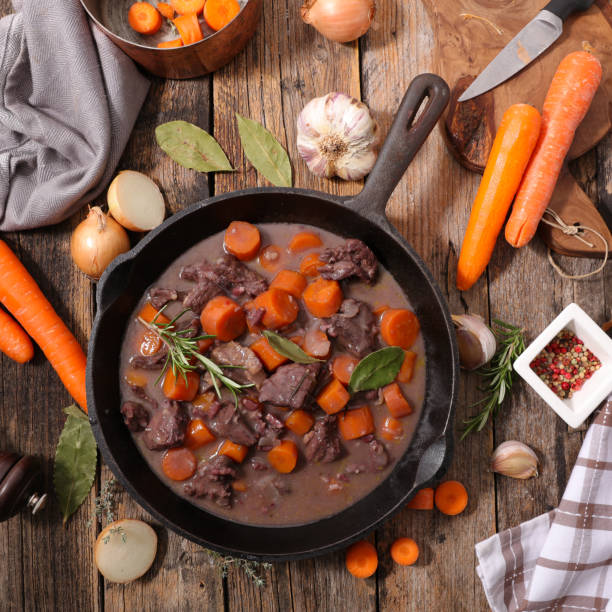 istock beef,  carrot cooked with sauce and herbs 1358193607