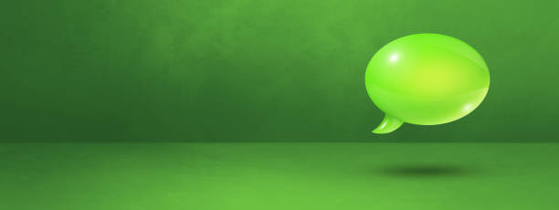 istock Green speech bubble on concrete wall banner background 1358195307