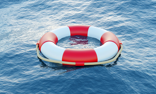 Lifebuoy on the ocean. Rescue and assistance concept.