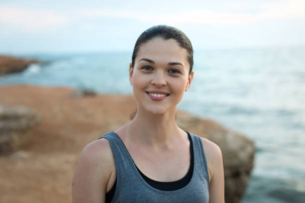 istock Smiling Female Jogger at Sunset 1358197700