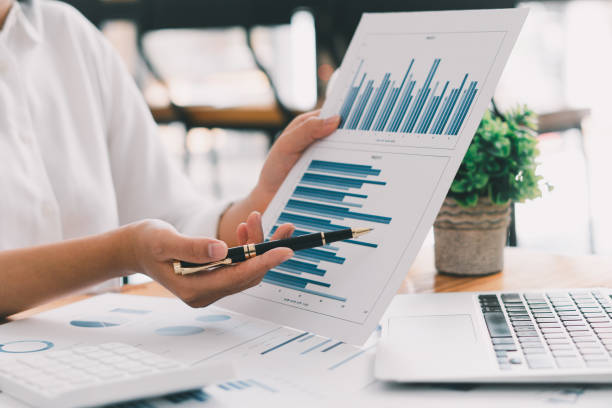 istock Business people working with graphs, business documents on their desks to analyze for business startups. 1358198954