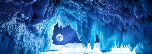 istock Ice cave. Winter lunar landscape. Lake Baikal. Banner format. 1358199095