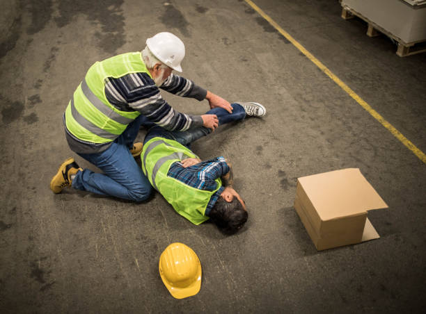 istock Warehouse worker after an accident in a warehouse 1358200872