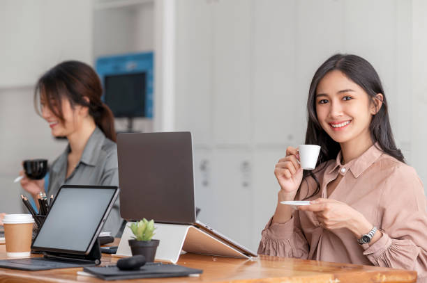 istock Young woman enjoying and relaxing during work at office. 1358202183