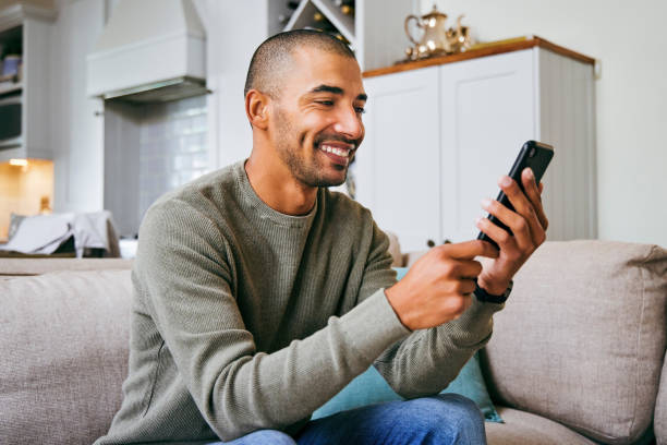 istock Shot of a man using his smartphone to send a text message 1358204870
