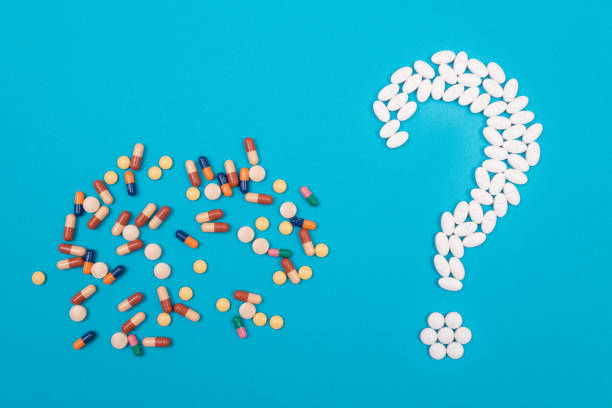 istock White Question Mark. Pharmaceutical Industry and Medicinal Products 1358205647