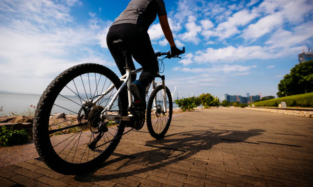 istock Riding bike on the sunrise coast path 1358212896