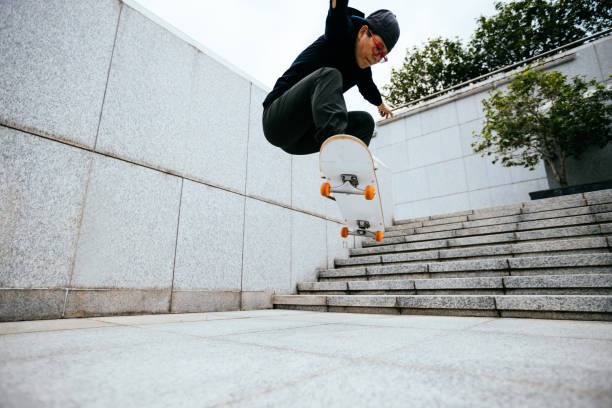 istock Skateboarder skateboarding outdoors in city 1358213259