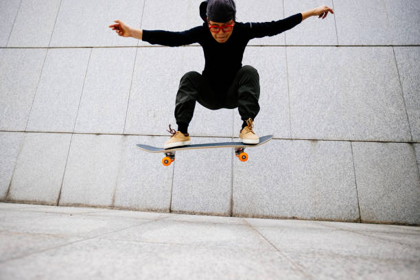 istock Skateboarder skateboarding outdoors in city 1358213273