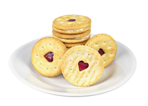 istock Heart shaped biscuit or cookies on white dish isolated on white background with clipping path. 1358213404