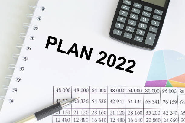 istock Plan 2022 text on a notepad on an office desk. Business motivation or management. 1358216875