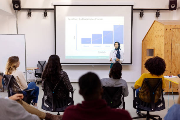 istock Middle eastern businesswoman giving a presentation in seminar 1358218745