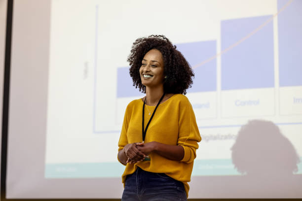 istock Woman entrepreneur presenting her ideas during a seminar 1358219400
