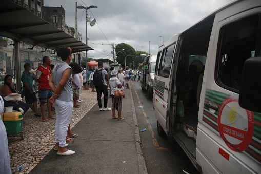 salvador, bahia, brazil - december 8, 2021: Alternative transport van seen waiting for passengers at a bus stop in Salvador city