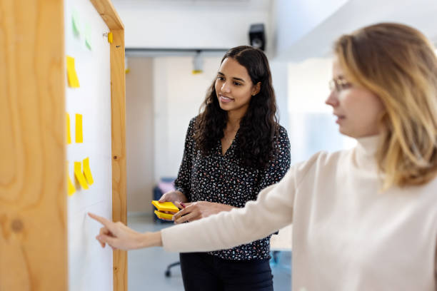 istock Coworkers planning on new strategy for the project in office 1358220097