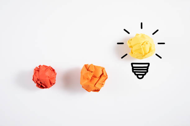 istock Crumpled Paper Light Bulbs Background 1358221326