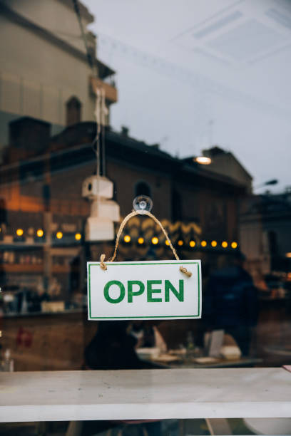 istock Open sign on small business window 1358223562