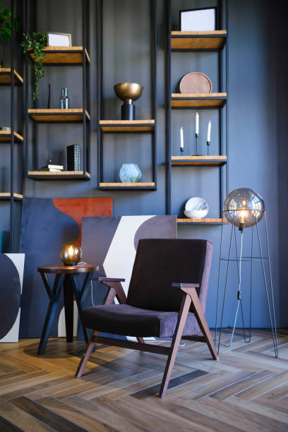 istock Interior with dark chair and shelves 1358231810