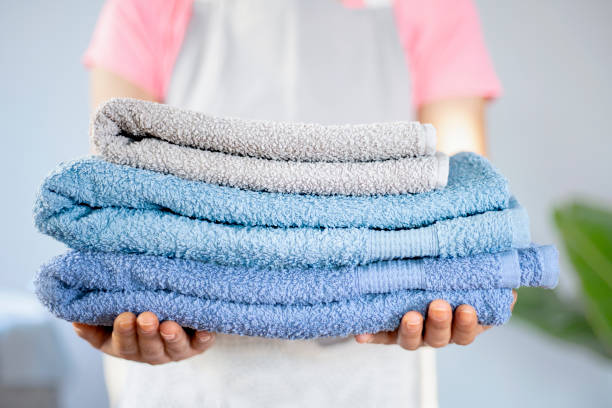 istock woman ironing clothes at house 1358233638