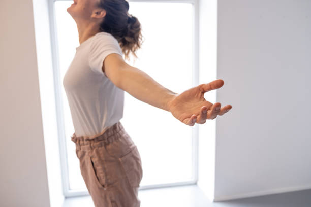 istock Woman relaxing at home - the Feldenkrais method 1358234126