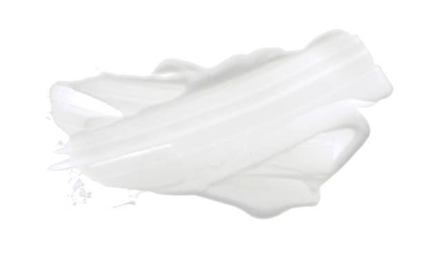 istock Abstract acrylic white color smear brush stroke. Isolated on white background. 1358235563