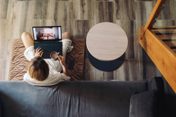 istock Young woman working at home 1358240108