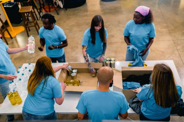 istock Young team of volunteers working together 1358240265