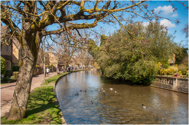 burton on the water small vilage in the centre of Cotswold small village in the center of Cotswold, famous for its river running in the middle of town, packed with tourists every day burton sussex stock pictures, royalty-free photos & images