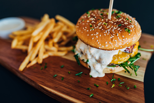 Soft bun, burger sauce, crispy salad, perfect piece of meat and melted cheese - the perfect combination of taste and texture.