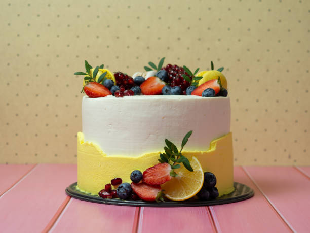istock beautiful birthday cake decorated with berries with place for text 1358247142