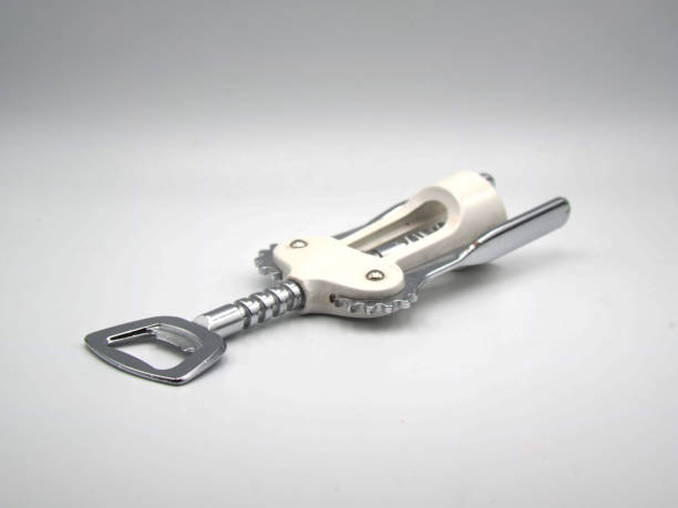 istock Metal wine opener with white plastic handle on white background 1358249338