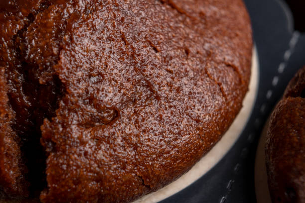 istock Textured chocolate muffin. Sweet Christmas dessert. Macro 1358249782