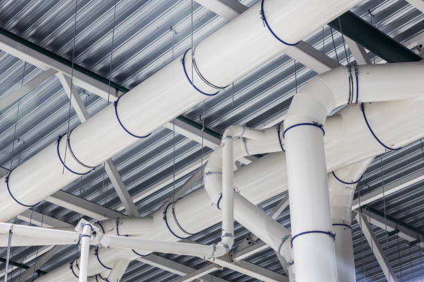 istock Industrial factory ceiling with ventilation system and air vents 1358251084