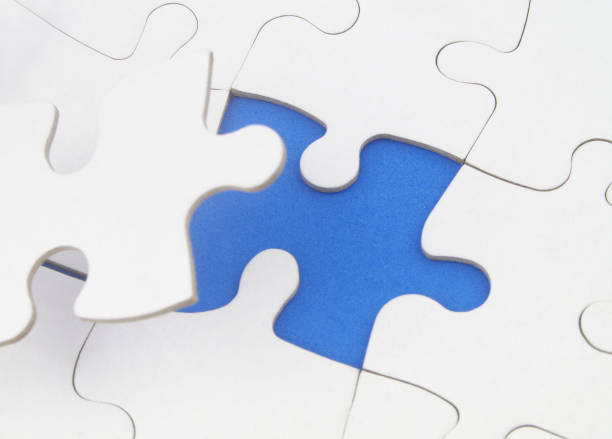 istock Many jigsaw puzzles, one piece missing and ready to connecting. 1358253942