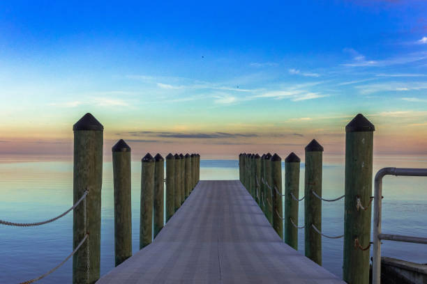 istock Pier going into the distant horizon over the Gulf of Mexico 1358257308