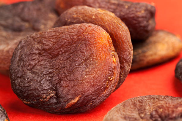 istock dark dried apricots of large size 1358259580