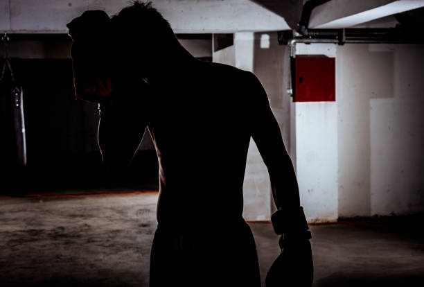 istock One Caucasian man exercising boxing in silhouette 1358267939