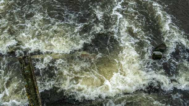 istock Boiling water in a cold river. Abstract background. Space for text. 1358268060